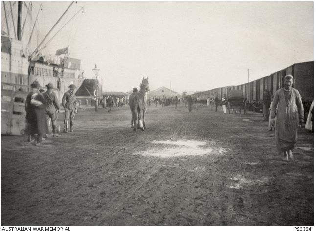THE 4TH LIGHT HORSE UNLOADING AT . Image courtesy of the Australian War Memorial. Image no. PS0384 http://www.awm.gov.au/collection/PS0384/